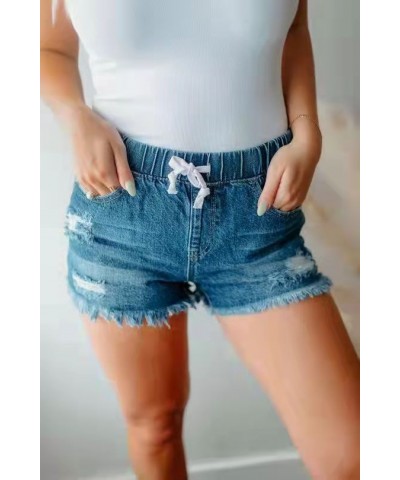 Vaqueros informales desgastados y desgastados con bordes sin rematar y color liso $25.35 Jeans para mujeres