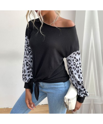 Suéter negro con estampado de leopardo y manga larga con cuello redondo de moda $24.88 Suéter femenino