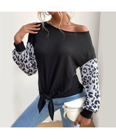 Suéter negro con estampado de leopardo y manga larga con cuello redondo de moda $24.88 Suéter femenino