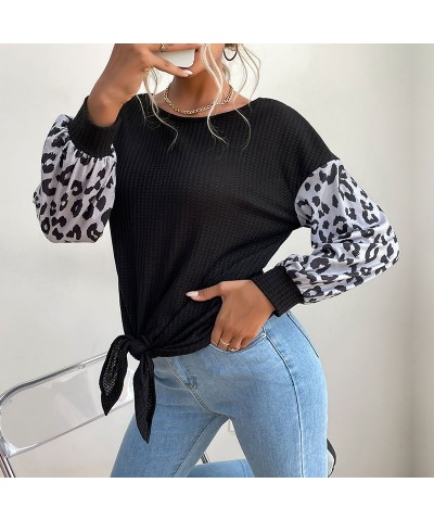 Suéter negro con estampado de leopardo y manga larga con cuello redondo de moda $24.88 Suéter femenino