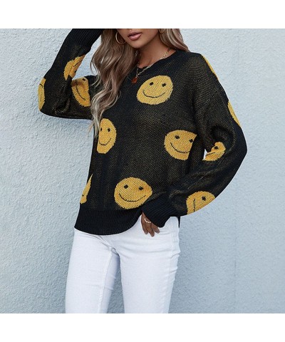 Suéter negro de manga larga sonriente, moderno e informal. $34.52 Suéter femenino