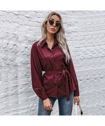 Camisa de color liso con solapa de manga larga negra ajustada con cintura retro $29.82 Camisa de mujer